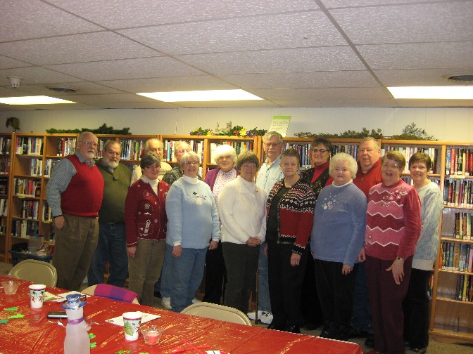 The Club gathers
                              for the group photo after the 2013
                              Christmas party.